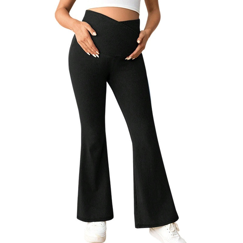Pantalones vaqueros premamá de cintura alta con cintura elástica.