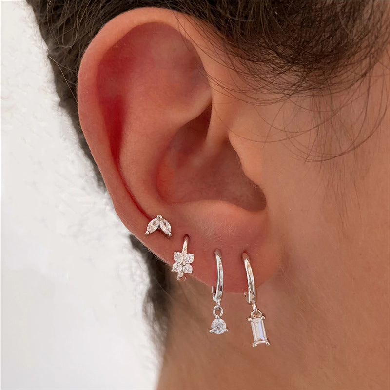 Conjunto de pendientes apilables con circonitas y forma de flor de ojo de caballo geométrico