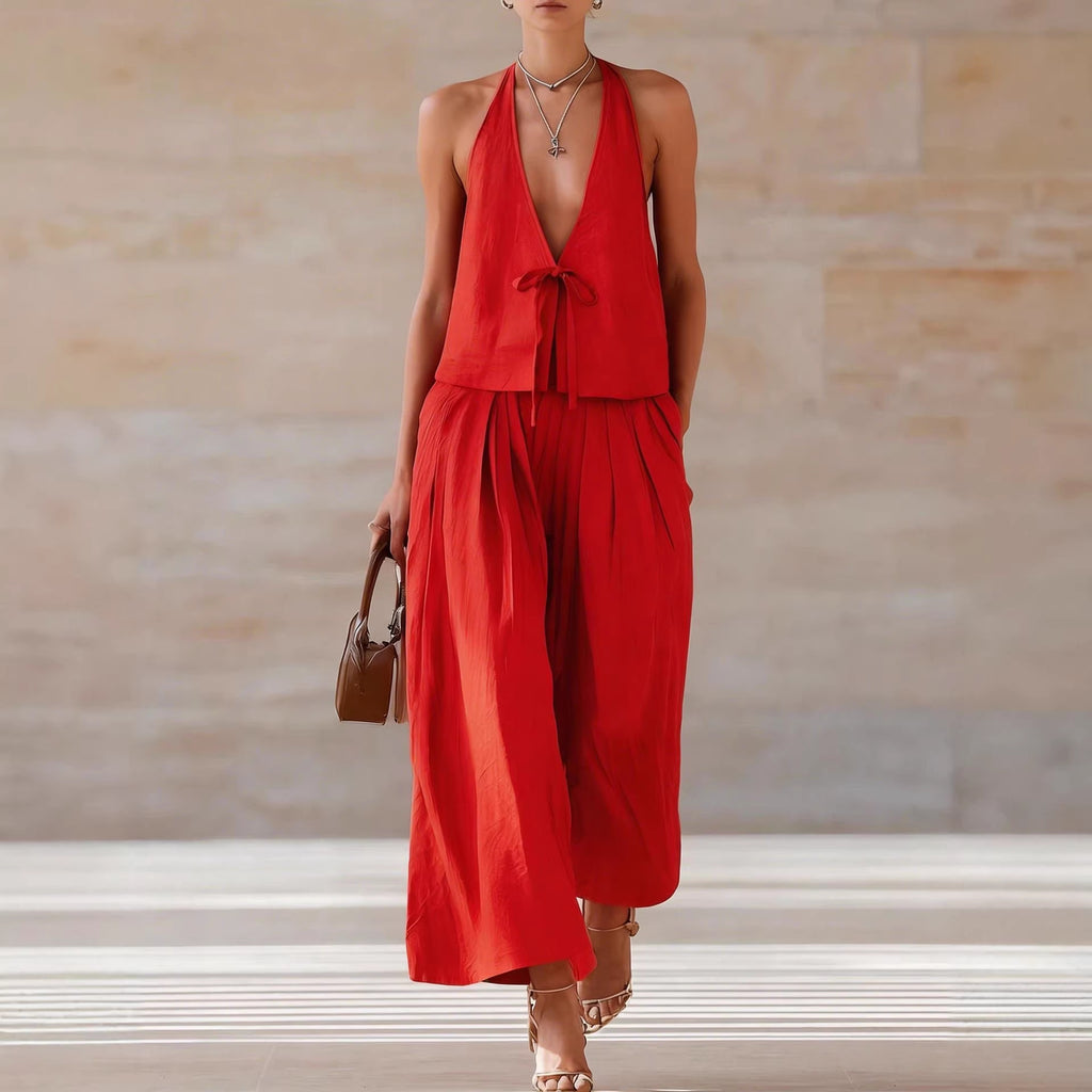 Conjunto de mujer moderno e informal compuesto por chaleco sin mangas y pantalones anchos holgados.