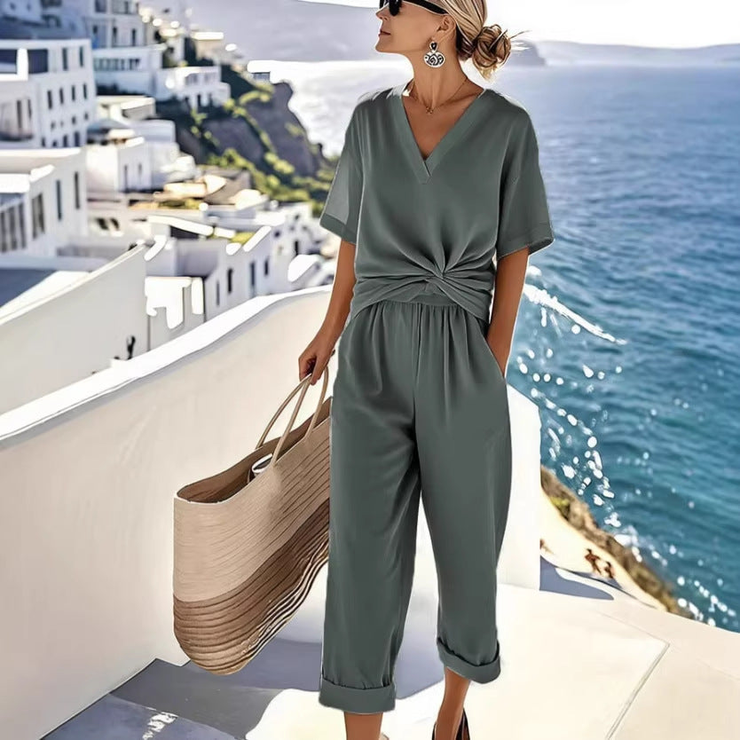 Traje de manga corta irregular de color liso a la moda