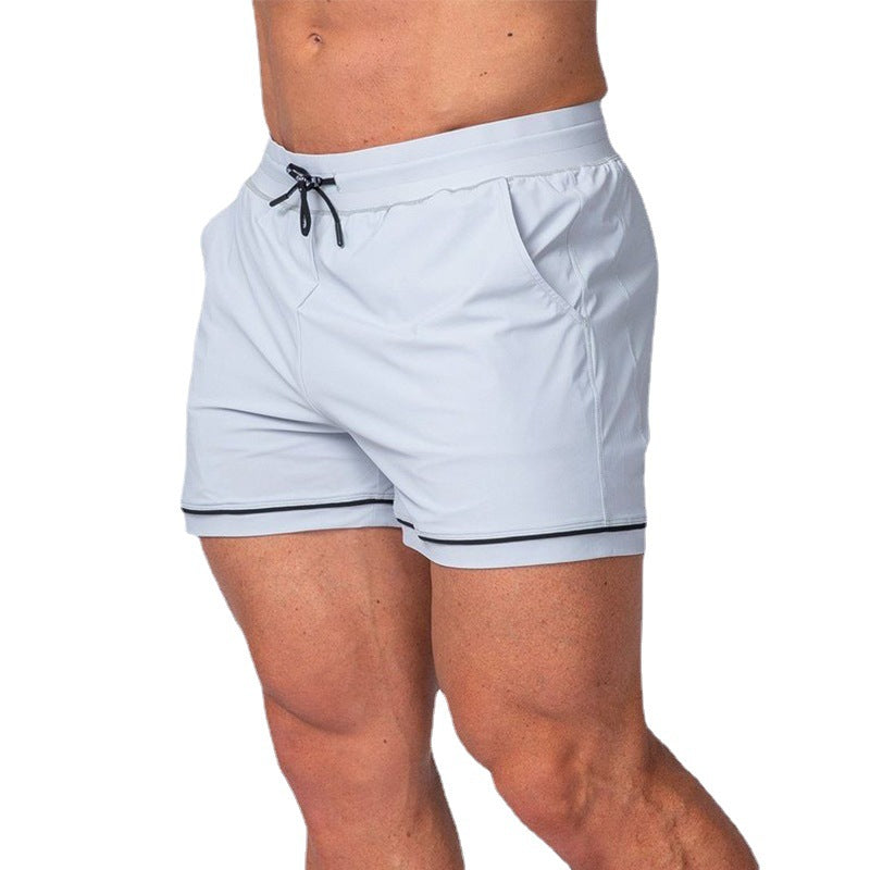 Pantalones cortos deportivos de secado rápido para fitness, running, entrenamiento, actividades al aire libre y playa.