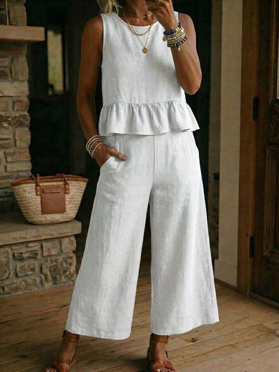 Conjunto de mujer de top sin mangas con volantes y pantalón corto de algodón y lino.