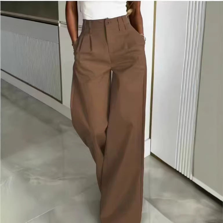 Pantalones casuales holgados y fluidos que favorecen la figura hasta el suelo.