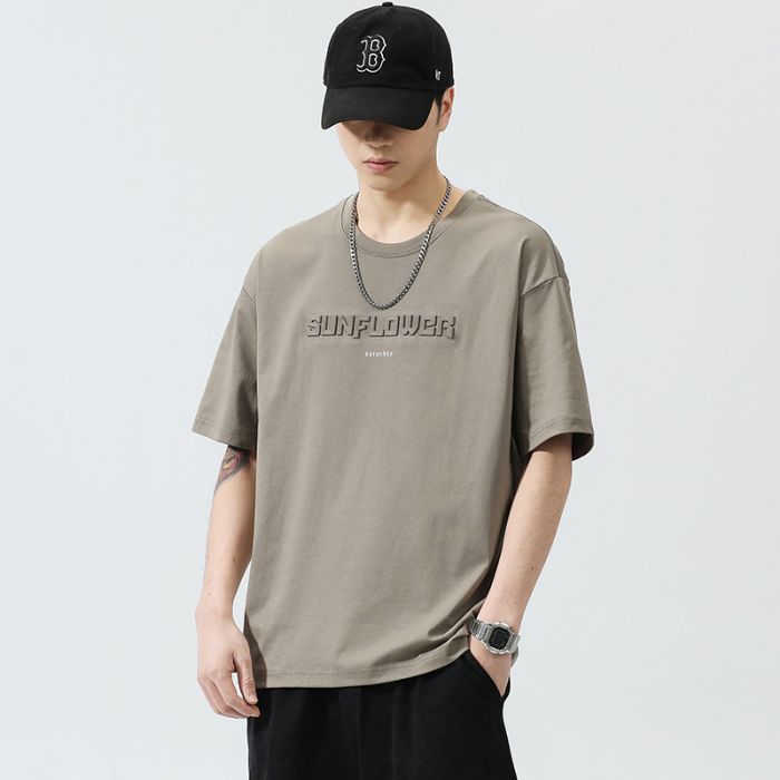 Camiseta de manga corta de tejido grueso, holgada y versátil, de estilo moderno para hombre.