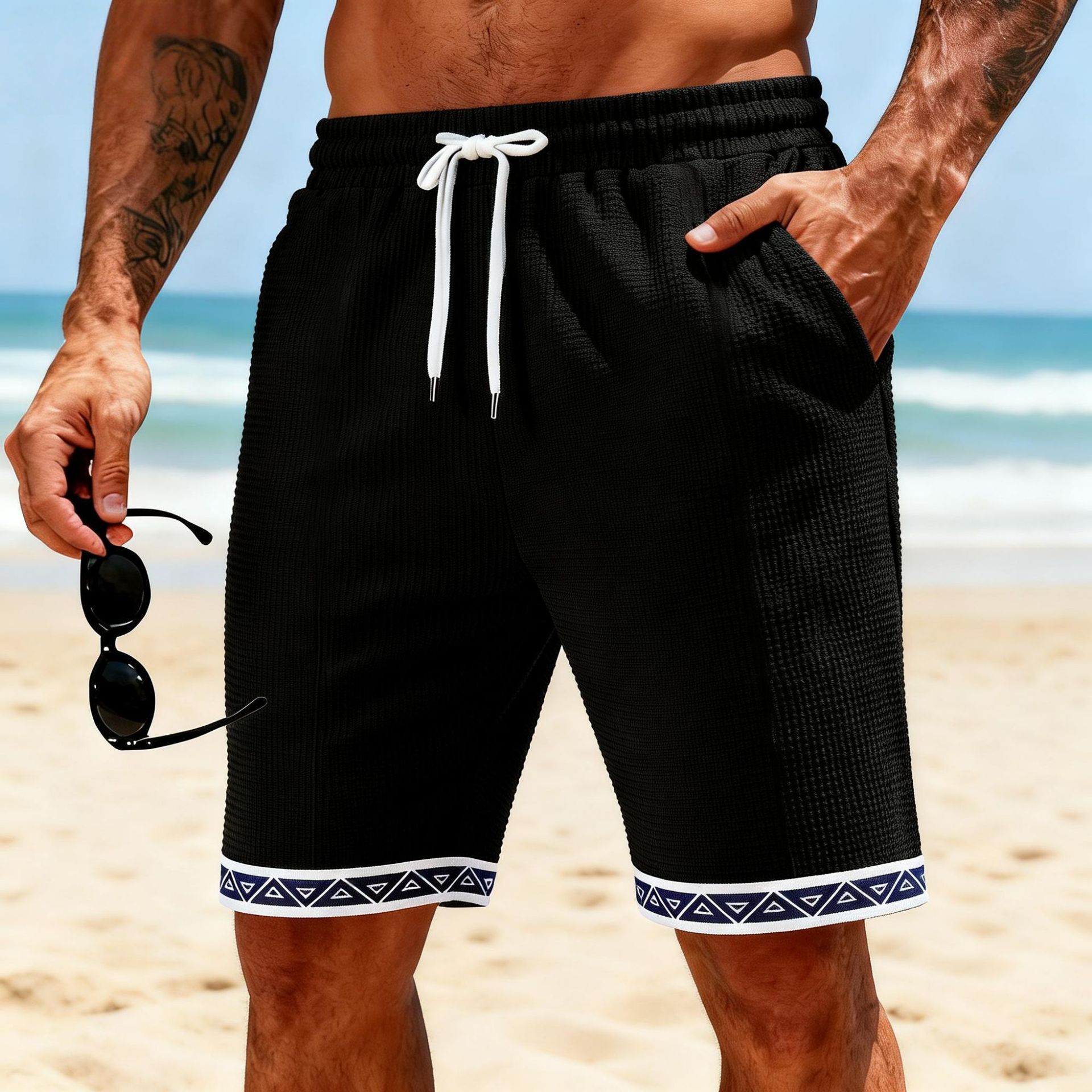 Pantalones cortos de playa transpirables con diseño de retazos y tejido gofrado.