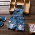 Distressed denim jumpsuit for girls