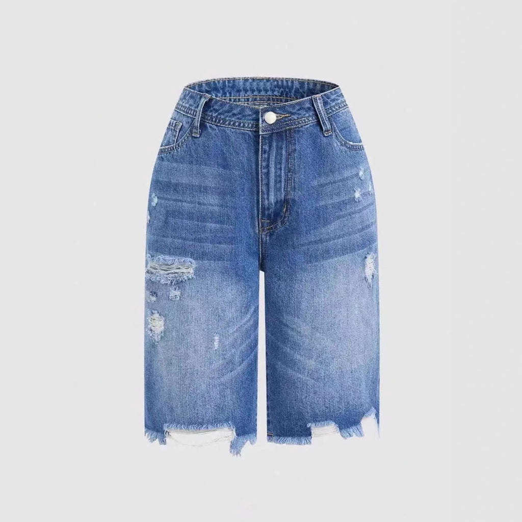 Pantalones cortos vaqueros rotos de largo medio — estilo casual