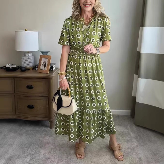 Vestido largo elegante y moderno con escote en V, cintura elástica y estampado de lunares.