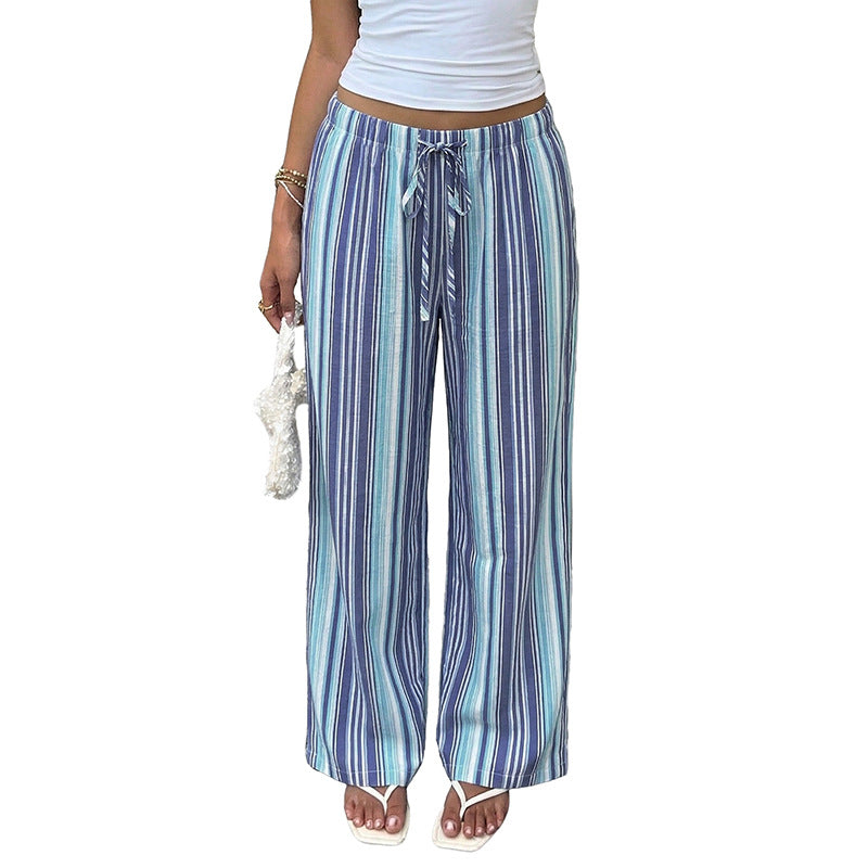 Pantalones anchos drapeados a rayas azules y blancas con cintura elástica