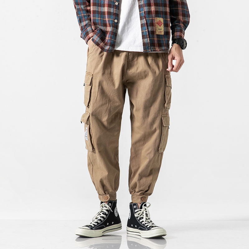 Pantalones militares casuales de corte ajustado para hombre.