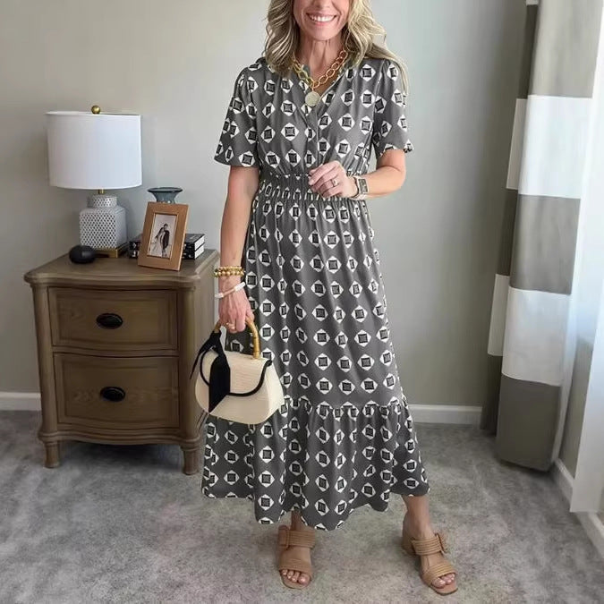 Vestido largo elegante y moderno con escote en V, cintura elástica y estampado de lunares.