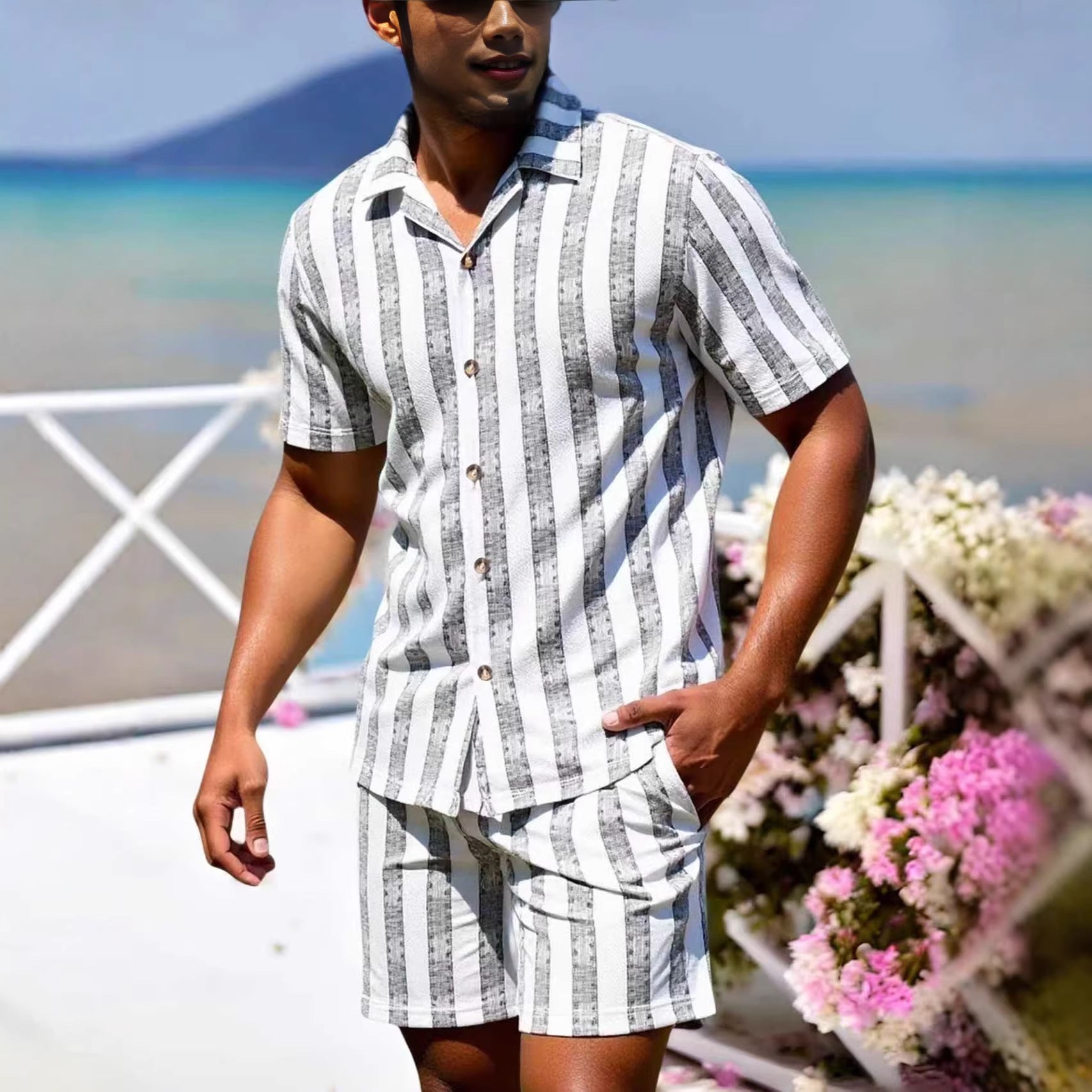 Conjunto informal de camisa y pantalón corto holgado para hombre, ideal para vacaciones.
