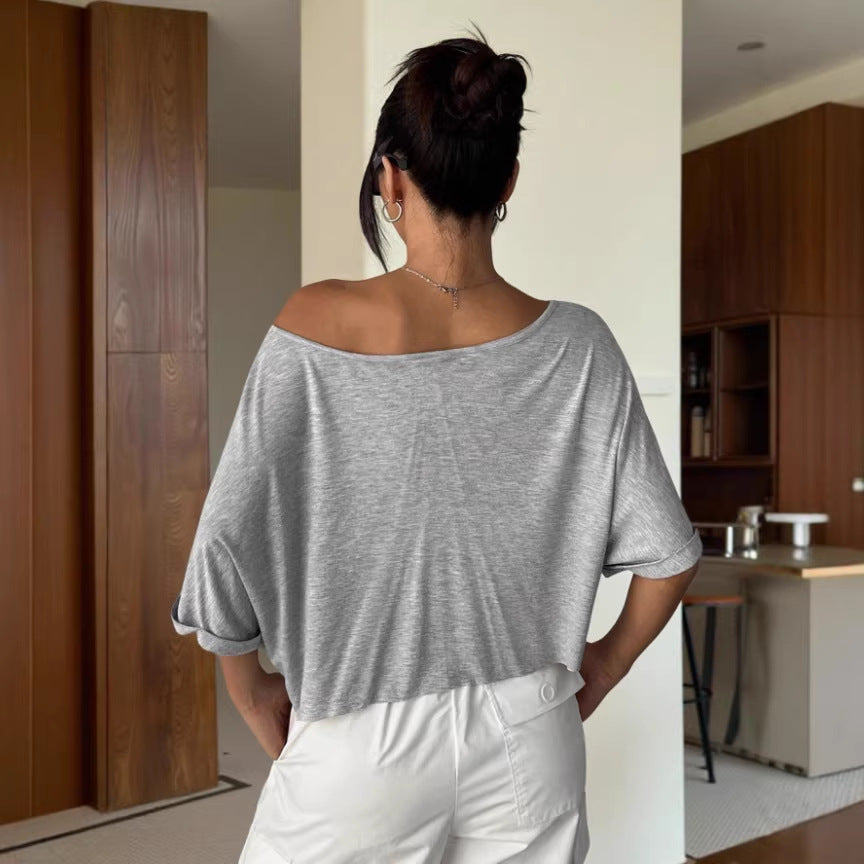 Camiseta corta sexy informal para mujer con hombros descubiertos y abdomen al descubierto.
