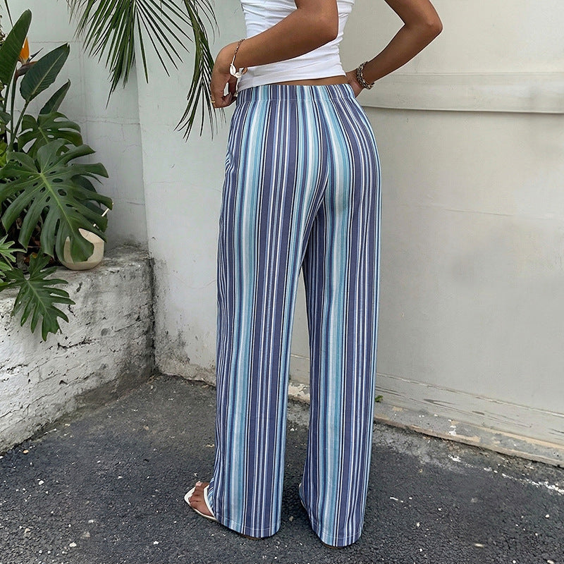 Pantalones anchos drapeados a rayas azules y blancas con cintura elástica