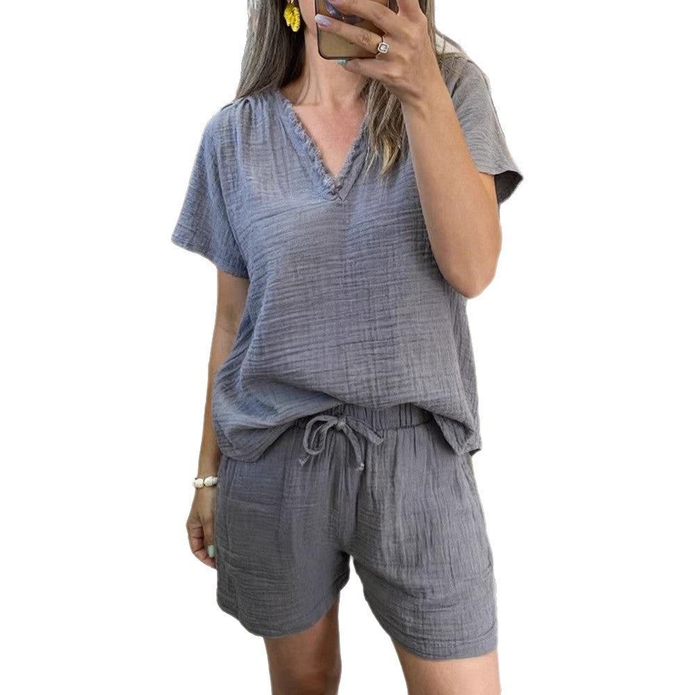 Conjunto informal de top de manga corta con cuello en V y shorts para mujer.