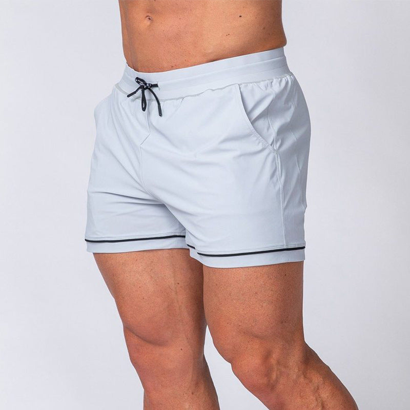 Pantalones cortos deportivos de secado rápido para fitness, running, entrenamiento, actividades al aire libre y playa.