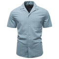 Camisa de algodón a rayas con cuello cubano para hombre.