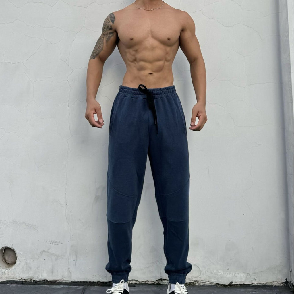 Pantalones deportivos americanos para hombre con puños y cordón ajustable.