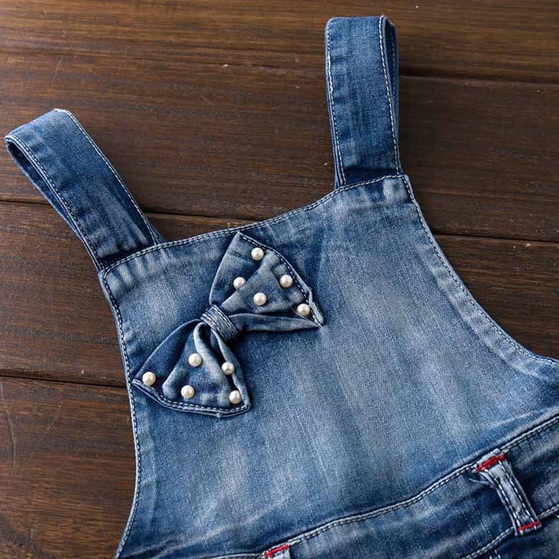 Distressed denim jumpsuit for girls