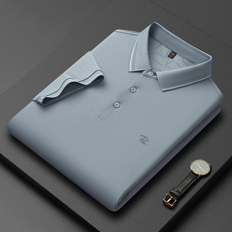 Camisa de manga corta para hombre con solapa y color liso.