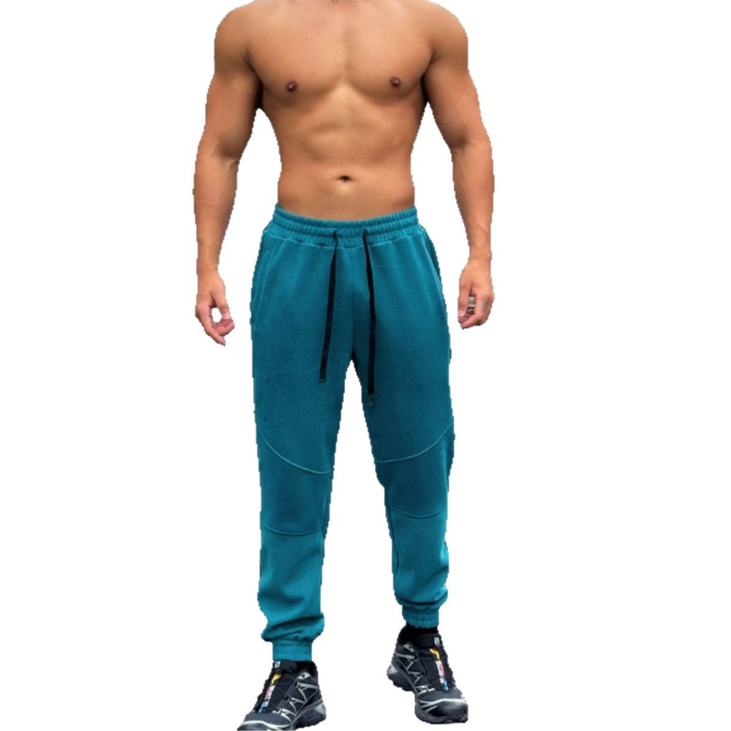 Pantalones deportivos americanos para hombre con puños y cordón ajustable.