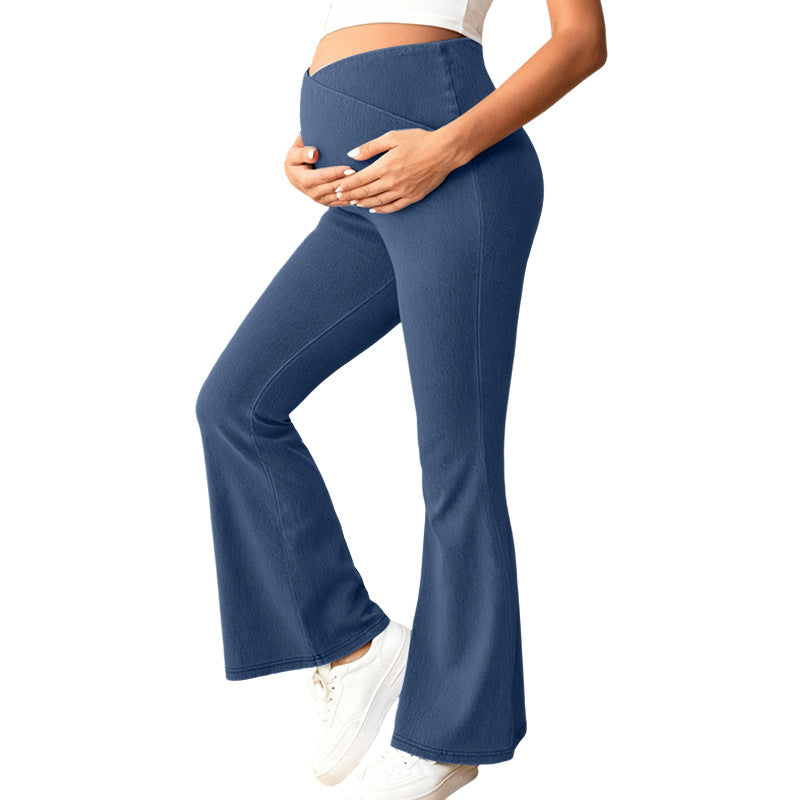 Pantalones vaqueros premamá de cintura alta con cintura elástica.