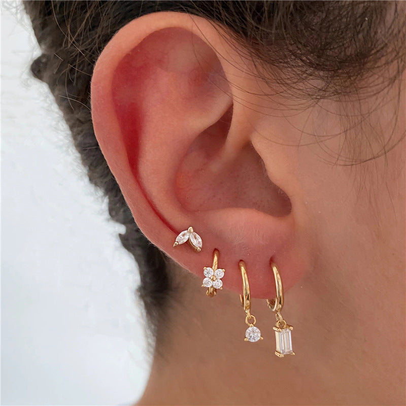 Conjunto de pendientes apilables con circonitas y forma de flor de ojo de caballo geométrico