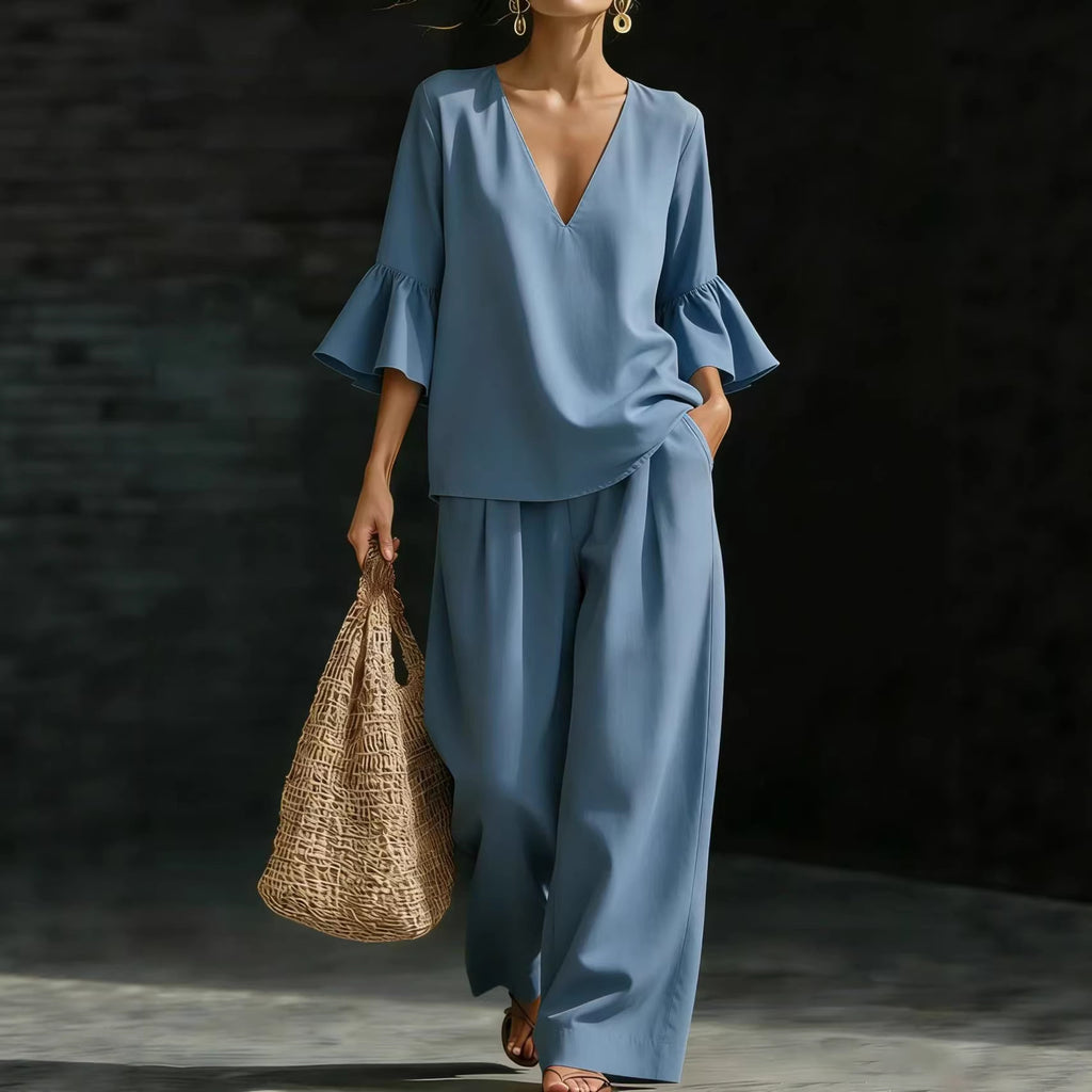 Conjunto de dos piezas para mujer: top con cuello en V y mangas con volantes y pantalón de pierna ancha.