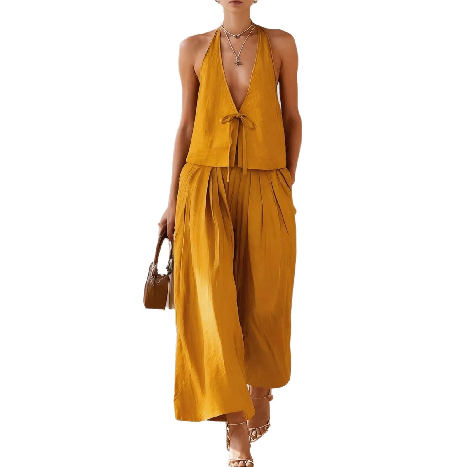 Conjunto de mujer moderno e informal compuesto por chaleco sin mangas y pantalones anchos holgados.