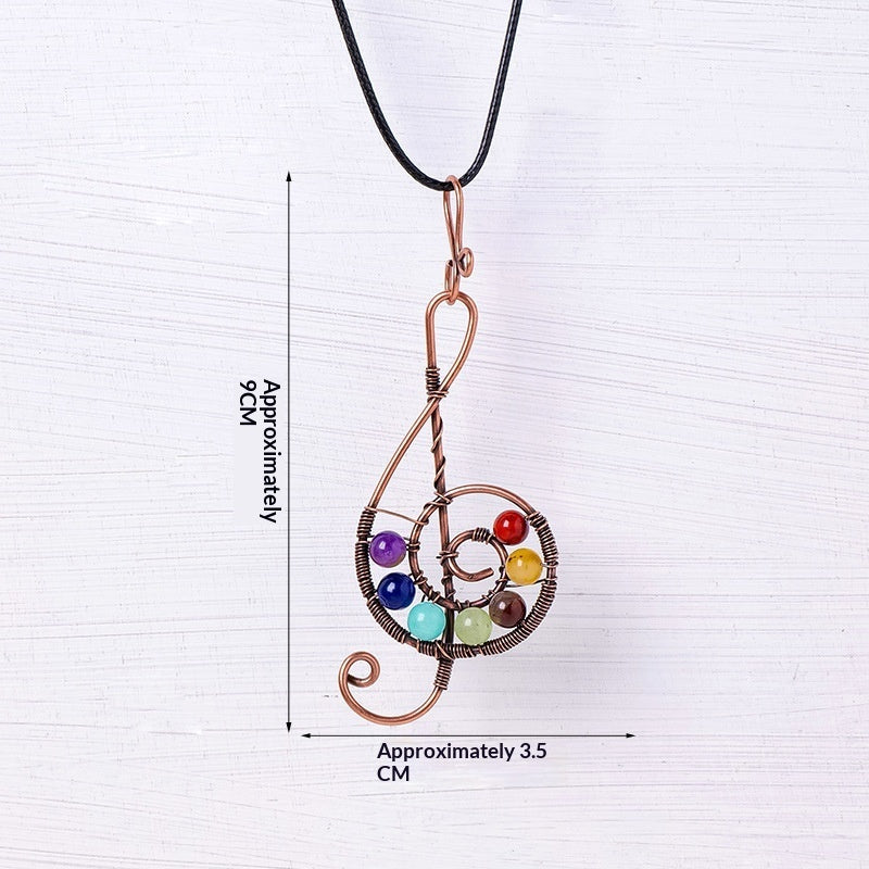Colgante de árbol de la vida con piedra triturada de cristal arcoíris natural, engarzado a mano con alambre.