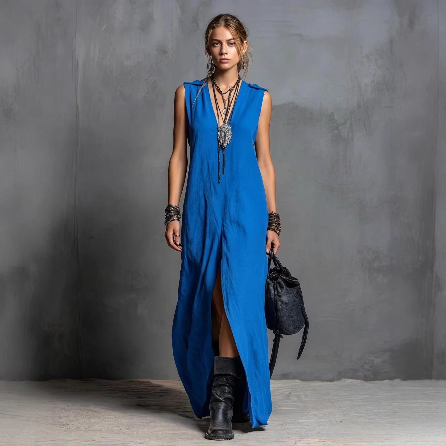 Long sleeveless V-neck dress with slit
