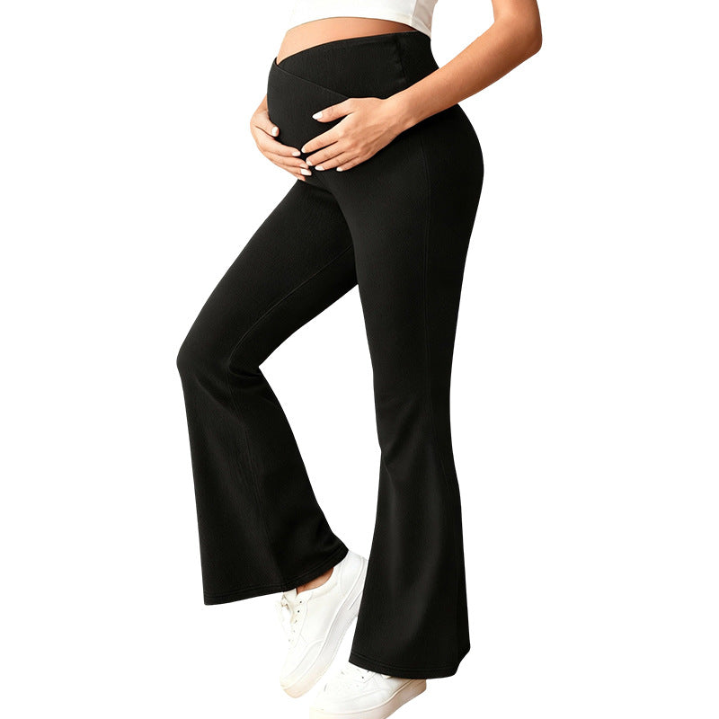Pantalones vaqueros premamá de cintura alta con cintura elástica.