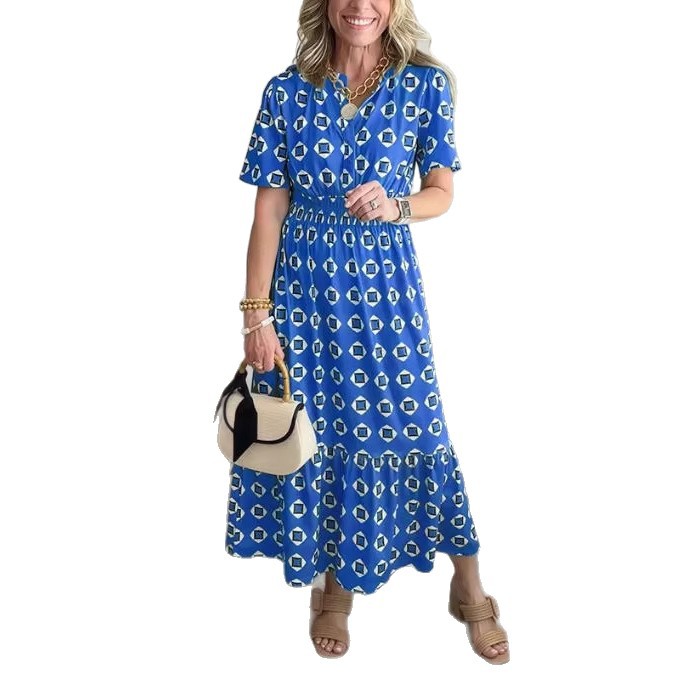 Vestido largo elegante y moderno con escote en V, cintura elástica y estampado de lunares.