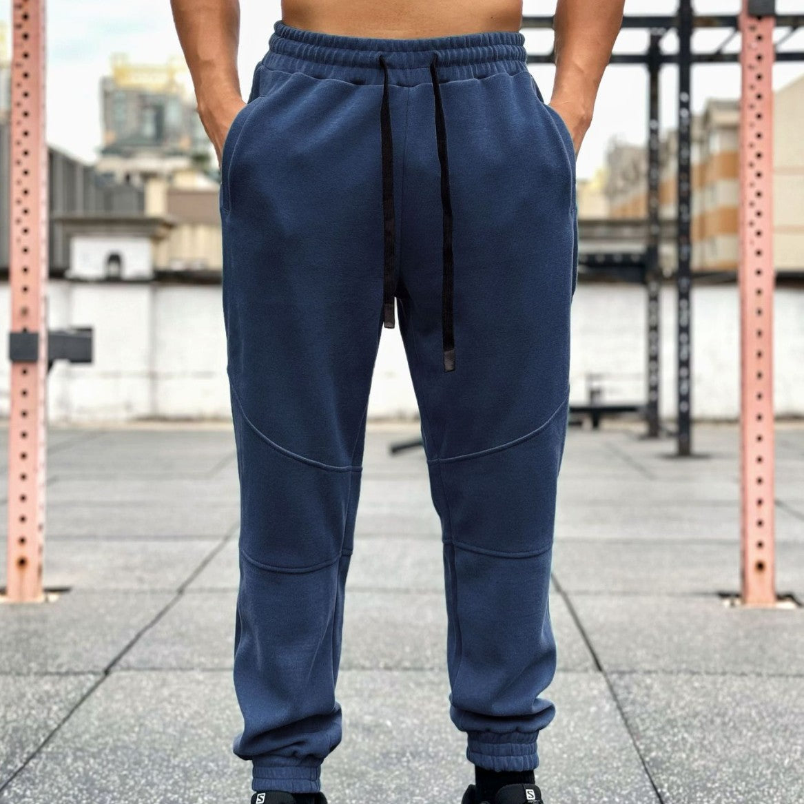 Pantalones deportivos americanos para hombre con puños y cordón ajustable.