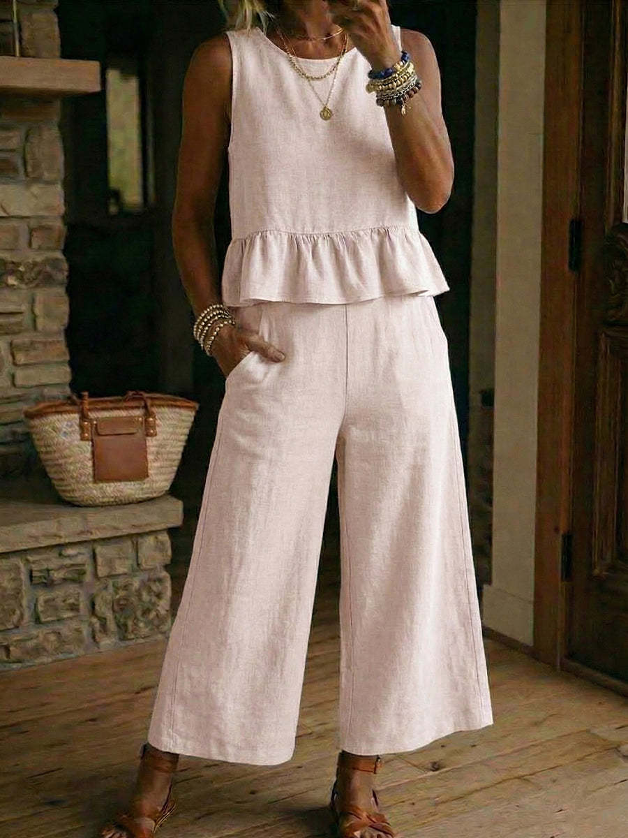 Conjunto de mujer de top sin mangas con volantes y pantalón corto de algodón y lino.