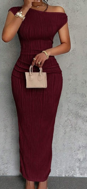 Elegant women's summer dress, ideal for parties, daily dates, with an asymmetrical neckline, one shoulder, open front, long pleated skirt and wavy texture.