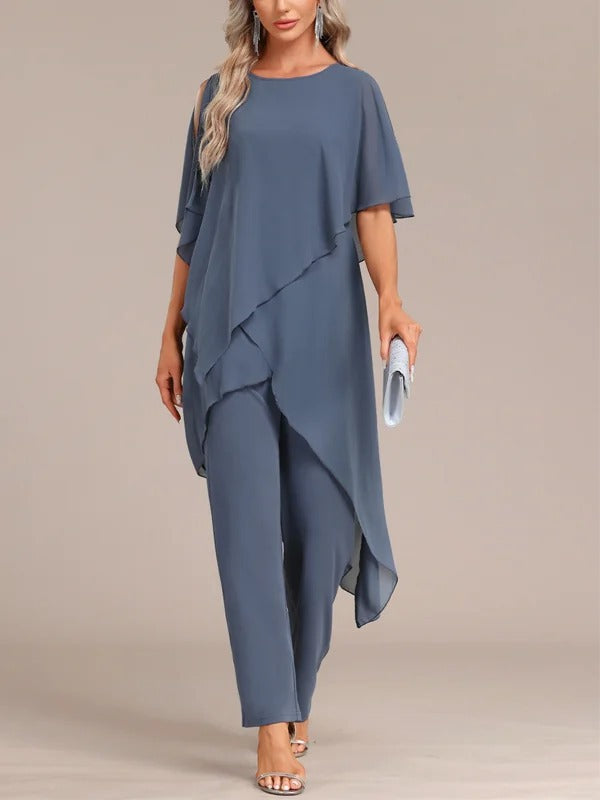 Conjunto de dos piezas para mujer: top de hombros descubiertos y pantalón de corte irregular.